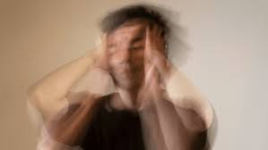 A blurry image of a person seeking religious trauma therapy in Chicago