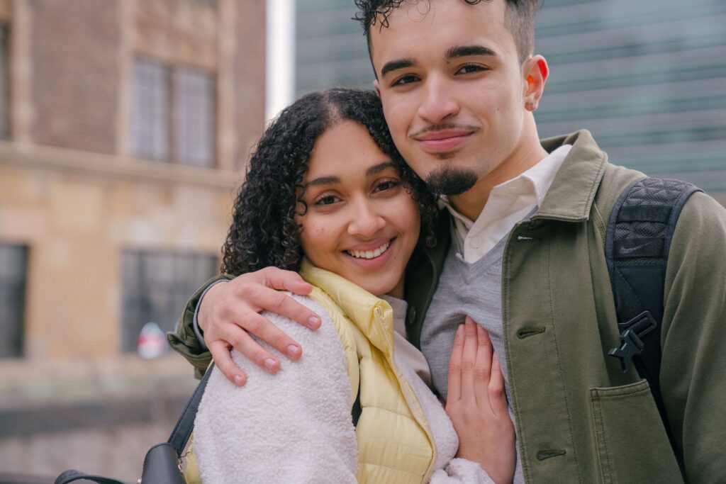 Happy Hispanic couple after Spanish couples therapy session